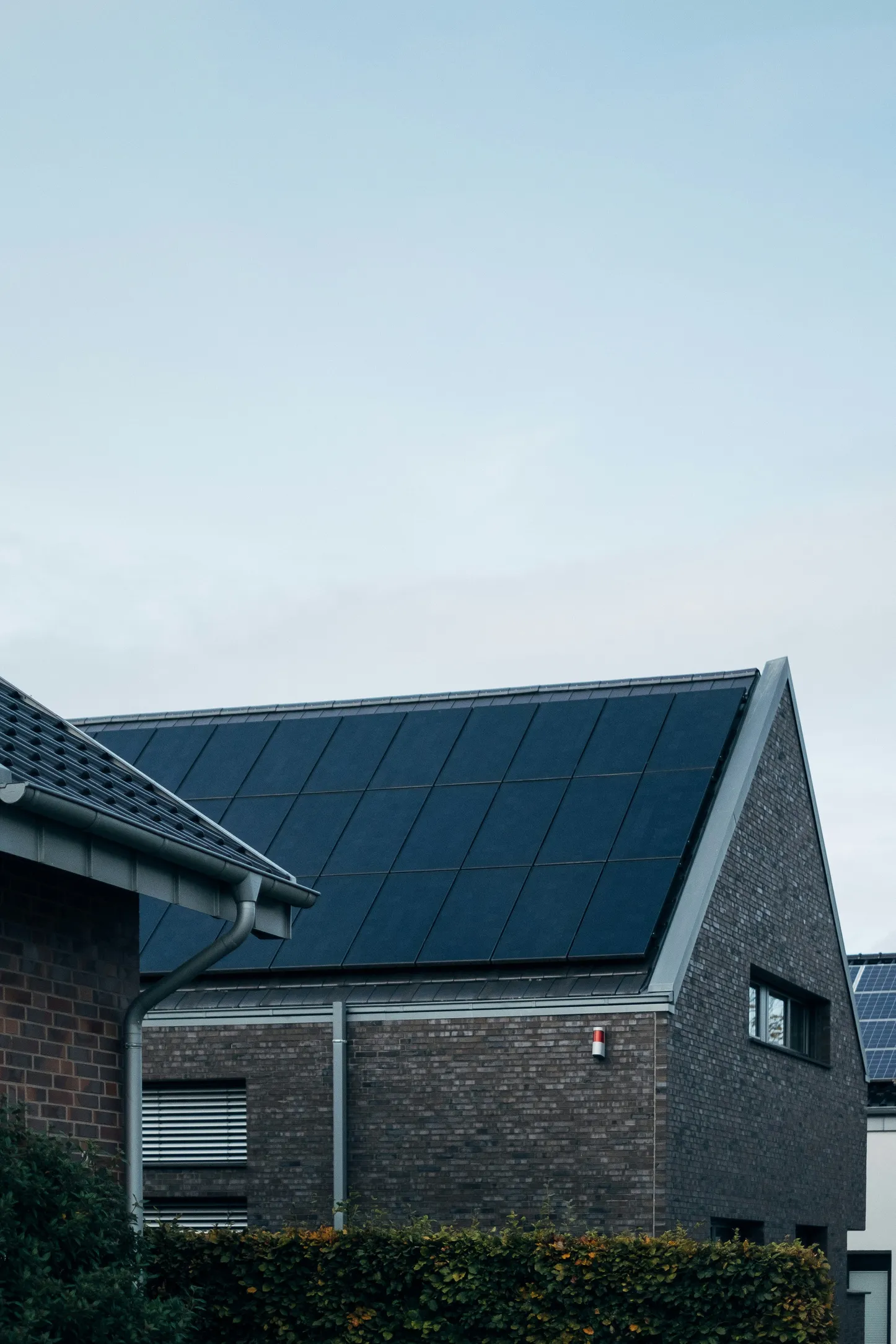 Residential Home — Black-on-black panel installation